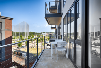Balcony with a table and chairs